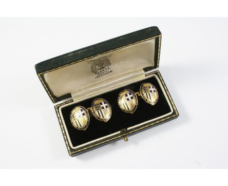 A PAIR OF ENAMEL AND GOLD CUFFLINKS depicting the coat of arms for HRH Prince Philip, The Duke of Edinbugh, maker's mark H.H.