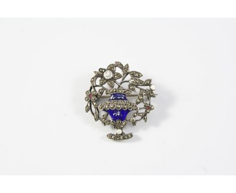 A 19TH CENTURY ENAMEL AND MARCASITE GIARDINETTO BROOCH mounted with blue and white enamel decoration, 3cm wide