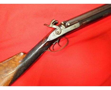 1860s English damascus double barrelled shotgun black powder fowling musket by J. Kemp. Features good dark wood stock with ch