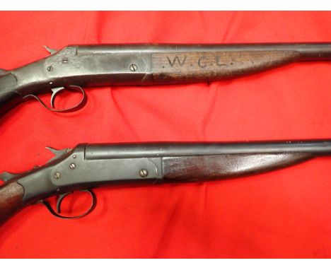 1920 U.S. Stevens single shot break action 12 guage deactivated shotguns (2).  Features solid wooden stocks, worn rubber reco