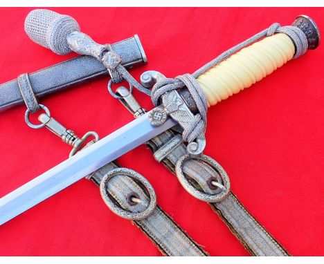 WW2 Nazi Germany Army officer’s dagger, scabbard, knot and hangers. Features excellent pommel cap and cross guard, with the c