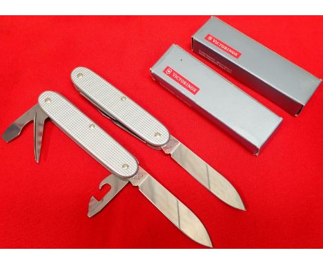 1990’s era Swiss Army knives (2). As new, 4 bladed multi knives, maker marked 7cm main blade,16.5cm with bright metal grips w