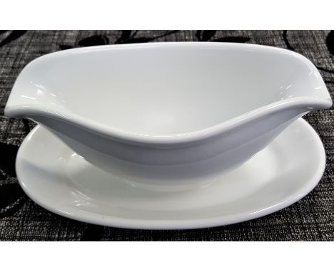 A WW2 German Luftwaffe mess ceramic gravy boat. Gravy boat measures 25.5cm x 11cm x 14.5cm, free of any damage or cracks, wit