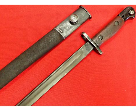 WW2 British admiralty S294 contract 1907 bayonet &amp; scabbard by Wilkinson Sword. Features dark wood grips, blackened metal