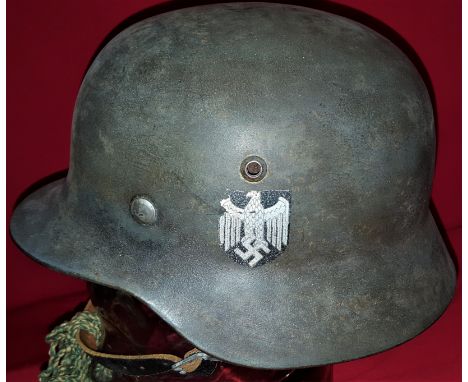 WW2 German Army single decal M35 steel helmet by Emaillerwerke A.G. Fulda. Model 1935 steel helmet, with single Heer decal (9