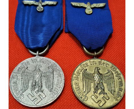 WW2 German Army 4 &amp; 12 year service medals (2). Toned frosted silver &amp; gilt finished medals, with eagles to ribbons.