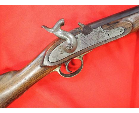 1820s English black powder musket converted percussion 1840s. Features good oak stock with one small wood patch. 84cm by 19mm