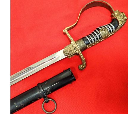 WW2 German officer’s lions head sword &amp; scabbard by Carl Eickhorn. Features gilt wash hilt fittings with cast pommel head