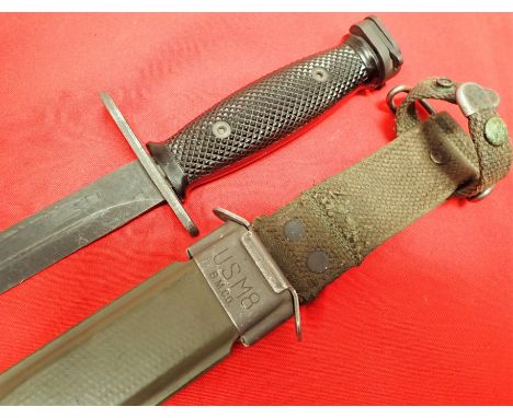 U.S. Vietnam gen cut bayonet &amp; scabbard. Features black chequered grips with screw pins, smooth working metal lock pommel