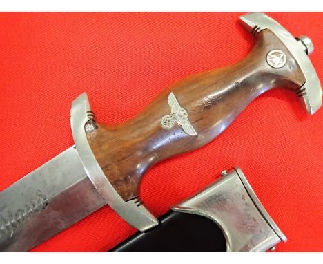 German S.A./N.S.K.K. 1933 1st pattern dagger &amp; scabbard by Paul Seilheimer. Features mid brown wood grip in correct nicke