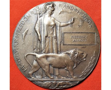 WW1 British Memorial Plaque to Lieutenant Frederick Arnott, who was killed in action 29/3/1918, having served with the 11th D
