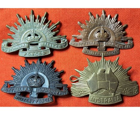 Australian Army rising sun hat badges (4). 2 x A.C.M.F. (WW1/WW2), 1 missing a lug; Korean War &amp; Australia badge - unoffi