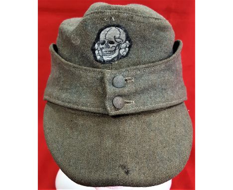 WW2 M43 German S.S. uniform field cap. Field grey wool body peak (showing folding to centre &amp; period small stitch repair)