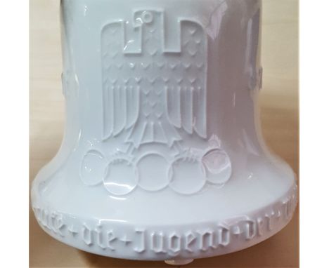 Pre WW2 German 1936 Berlin Olympics ceramic souvenir bell. White ceramic bell, measuring 12cm high, with blue maker mark (KPM