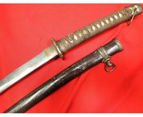 WW2 type 98 Japanese Army officer’s sword and scabbard. Features above standard officer’s type 98 hilt with silk wrap and qua