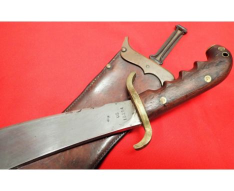 WW1 U.S. M1904 Hospital Corps bolo knife with scabbard by Springfield Armory dated 1911. Features a wooden moulded handle wit