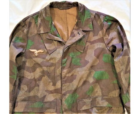Rare WW2 German paratrooper’s uniform jump smock. Constructed of waterproofed mid-weight cotton/rayon blend material with pri