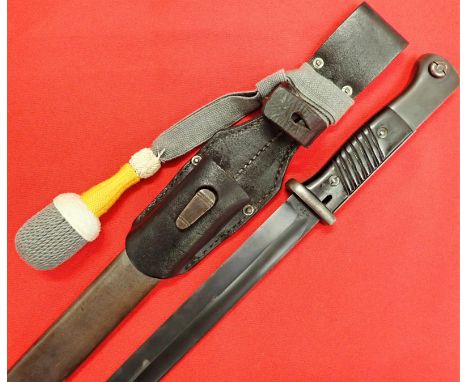 WW2 German matching numbered K98 bayonet, scabbard, frog &amp; knot by Mundlos. Features birds head pommel, moving locking bu