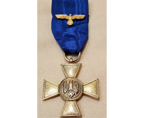 WW2 German Army 25 year service medal/cross. Toned gilt finished, showing a couple of pitting points to cross edges, with eag