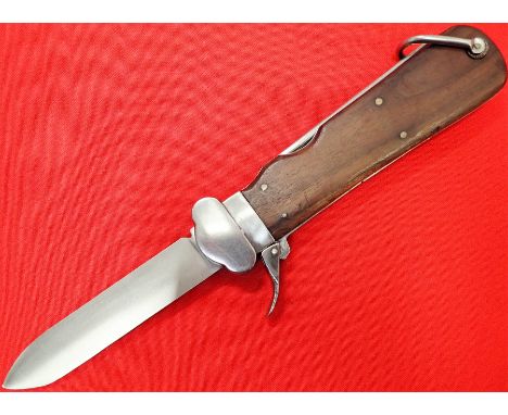 WW2 replica German Luftwaffe Fallschirmjäger (takedown version) paratroopers gravity knife. Features wooden grips pinned to s