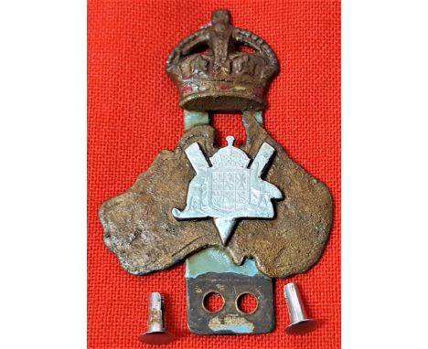 WW2 Australia patriotic vehicle badge. Cast brass Australia surmounted by Kings crown with Australian coat of arms superimpos