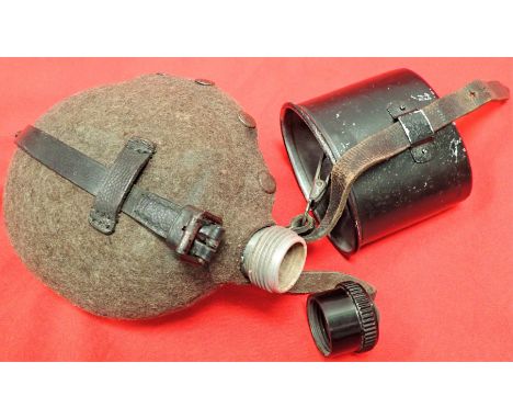 WW2 German Army water bottle flask MN42 with attachment clip. Numbered FSS-41 felt green cover with 4 press studs with light 