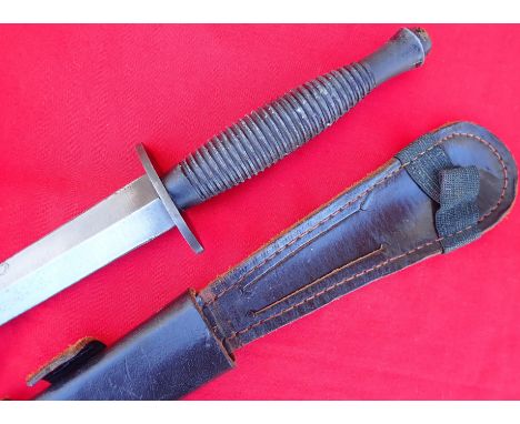 WW2 Fairbairn &amp; Sykes 3rd pattern commando dagger &amp; scabbard. Features ribbed cast grip, flat ball brass top pommel s