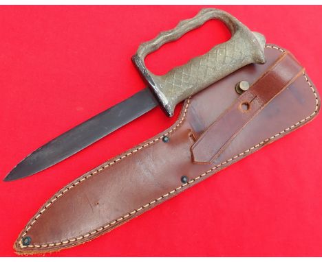 WW2 Australian &amp; New Zealand knuckle knife with blued blade. Features cast aluminium chequered grip with raised knuckle d