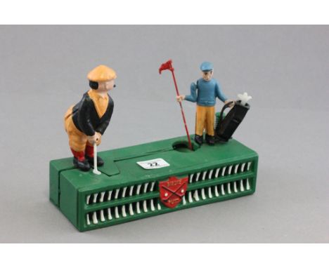 Novelty Cast Iron Moneybox in the form of Golfer and Caddy ' Birdy Putt '