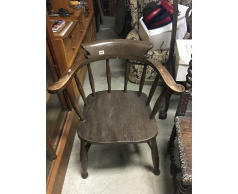 Two vintage elbow chairs