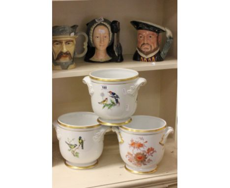 Pair of Ceramic Vista Alegre Jardinieres decorated with Birds together with another similar handpainted with flowers 