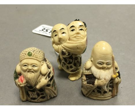 Three Netsuke carvings including Man with offering, Man carrying another man in sack etc