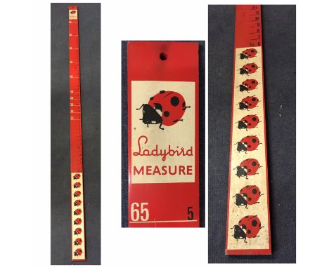 Vintage wooden Ladybird children's measuring stick