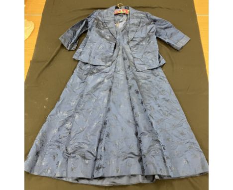 A mid-20th Century silk dress with matching jacket in blue, dress approx. 100 cm, approx. 98 cm at waist, together with an ev