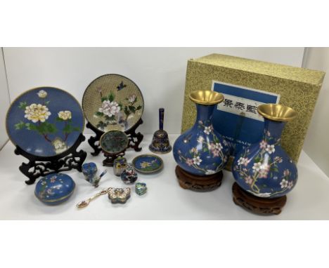 A collection of modern Chinese cloisonné ware including a pair of boxed blue ground onion-shaped vases on stands, 22 cm high 