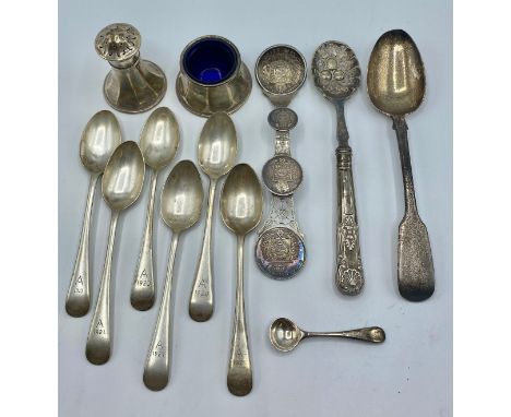 A collection of sterling silver items , a set of six tea spoons . salt and pepperette and a Georgian desert spoon (223g) toge