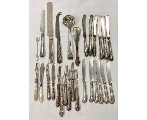 A collection of silver and white metal handled cutlery to include a set of six fruit knives by Walker &amp; Hall. 