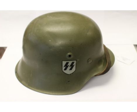 WW2 Third Reich M42 Stahlhelm steel helmet restored with replica single SS decal. Maker HKP size 64 shell. Complete with line