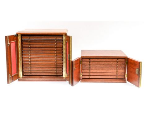 A pair of small wooden coin cabinets:one with fourteen shelves. Each shelf is 24cm x 23cm. And another the same size but with