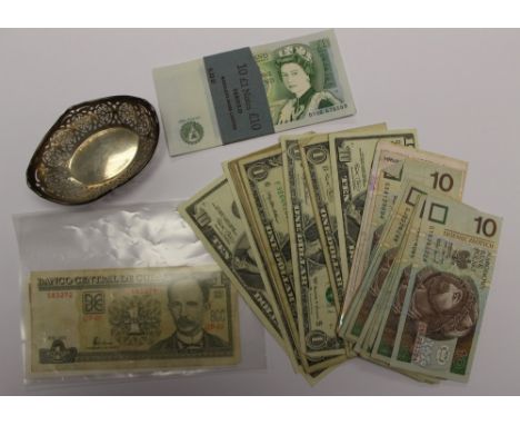 A bag of banknotes Bank of England One Pound Somerset Series D run of £10 face value, USA and World. Plus a Silver trinket ba