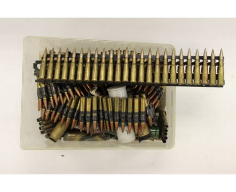 A collection of INERT ammunition to include: a full feed clip for the Hotchkiss MG with 24 rounds 4/48 dated: a belt of disin