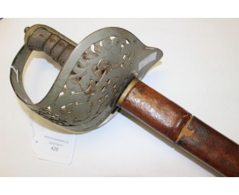 British Officers Sword. Bright plated blade with etched decoration. 82cm in length. VR Marked guard. Complete with scabbard w