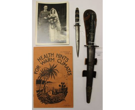 WW2 British 3rd Pattern F-S Fighting knife. Mold No4 cast in black metal grip. 17cm blued steel double edged blade. Complete 