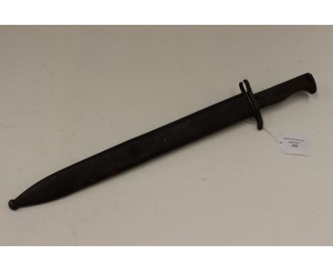 WW1 Imperial German Ersatz Mauser bayonet with sawback blade. Cast metal grip. Complete with scabbard.