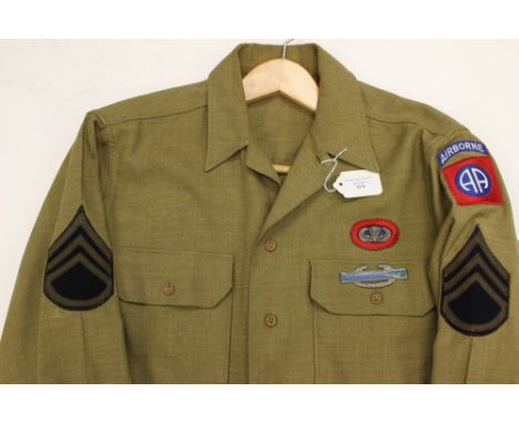 WW2 US Army Enlisted mans Wool shirt. Gas flap has been cut away. Has originally applied WW2 82nd Airborne shoulder sleeve in