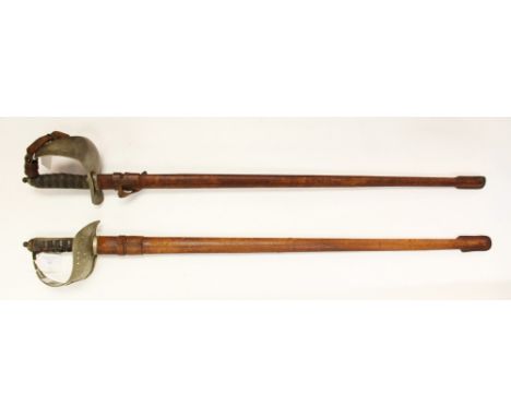 WW1 British George V Swords: Pair: first has 83cm blade with makers mark "Fenton Brothers Sword Cutlers to the War Office". S