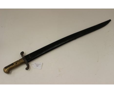 French 1840 Pattern Yataghan Bayonet. Dated 1855 to spine of 57cm blade. Brass grip. Complete with steel scabbard.