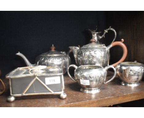 An Art Nouveau Walk &amp; Hall Sheffield tea service with a similar jug and plated butter dish.