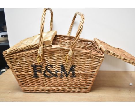 A large vintage wicker Fortmun &amp; Mason picnic basket, no contents.