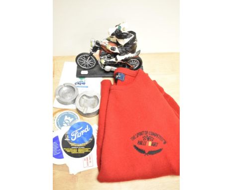 Two bespoke metal ashtrays, the largest having a diameter of 9cm, a Highway Holsteins resin motorcycling cow study, a vintage